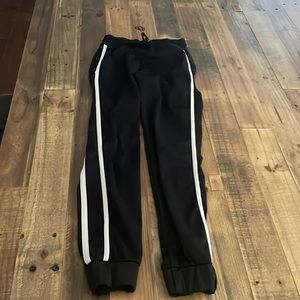 These are striped joggers from Five Dancewear. They’re black and white. Size YL.